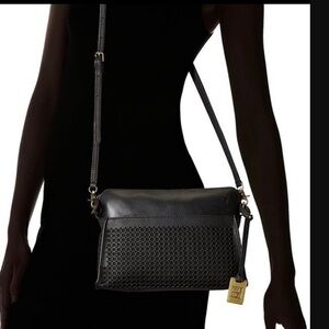 Frye Peyton perforated leather crossbody clutch bag. Black.